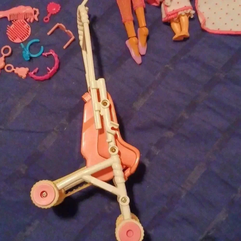 2 vintage Mattel Barbie dolls , one  Ken and one mini with extras